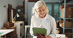 Ecommerce, reading or happy woman with tablet in office, package delivery or track product distribution. Small business, shipping progress or mature entrepreneur on courier site, tech or supply chain