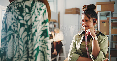 Buy stock photo Fashion, inspection or Indian woman in office with clothes, quality control or garment stock for ecommerce store. Style, check or designer with outfit, fabric approval or apparel review for webshop.