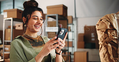 Buy stock photo Ecommerce, woman and laugh in office with phone for funny email, customer feedback and text message. Logistics person, smile and scroll in workplace with tech for online chat, internet joke or humor.