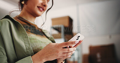 Buy stock photo Ecommerce, hands or reading with phone in warehouse, check product sales or digital inventory management. Supplier website, low angle or woman with mobile for online order, merchandise or stock admin