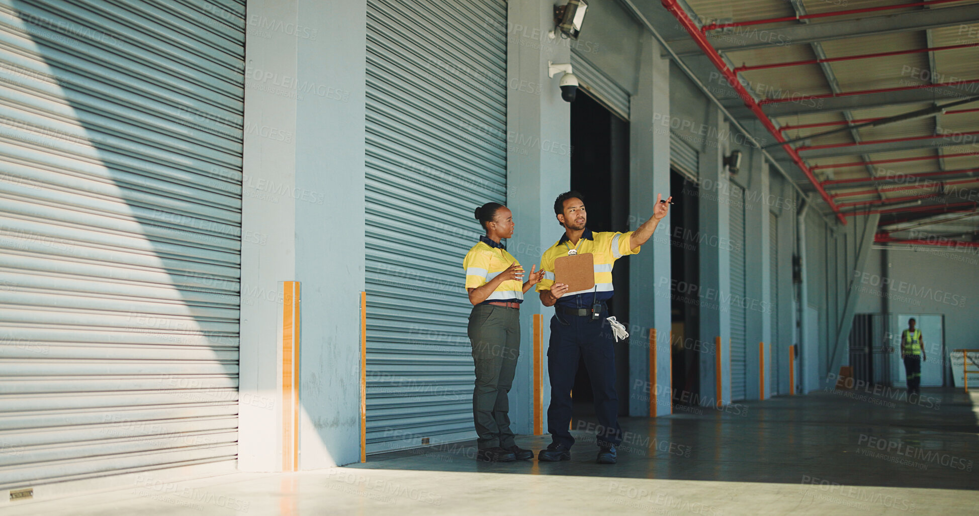 Buy stock photo Supply chain, coworkers and discussion at storage facility with clipboard, dispatch or shipping plan. Logistics people, talking or point at warehouse with checklist, distribution and quality control.