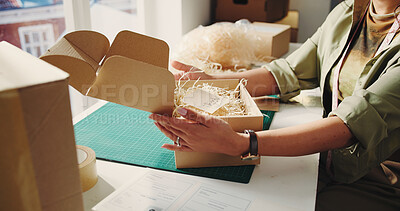 Buy stock photo Hands, woman and box at startup for ecommerce packaging, prep shipping and parcel note. Female person, packing and label for package delivery, order information and quality control for distribution