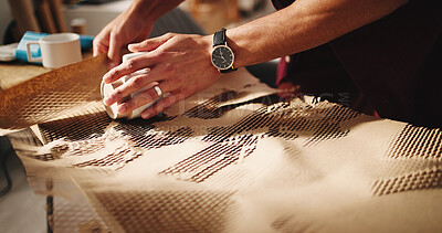 Buy stock photo Hands, brown paper and dropshipping with packaging at startup with cup, safety and fragile product. Person, seal and wrap mug for logistics, supply chain and entrepreneurship at distribution center