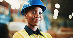 Happy, logistics and portrait of black woman in warehouse with confidence for industrial career. Smile, helmet and African female supply chain worker with pride for freight, cargo or delivery.