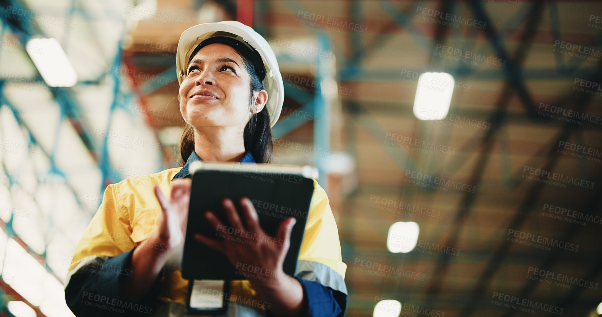 Buy stock photo Woman, tablet and warehouse inspection with smile, checklist or notes for inventory management. Person, tech and low angle with application, stock and thinking for supply chain at distribution plant