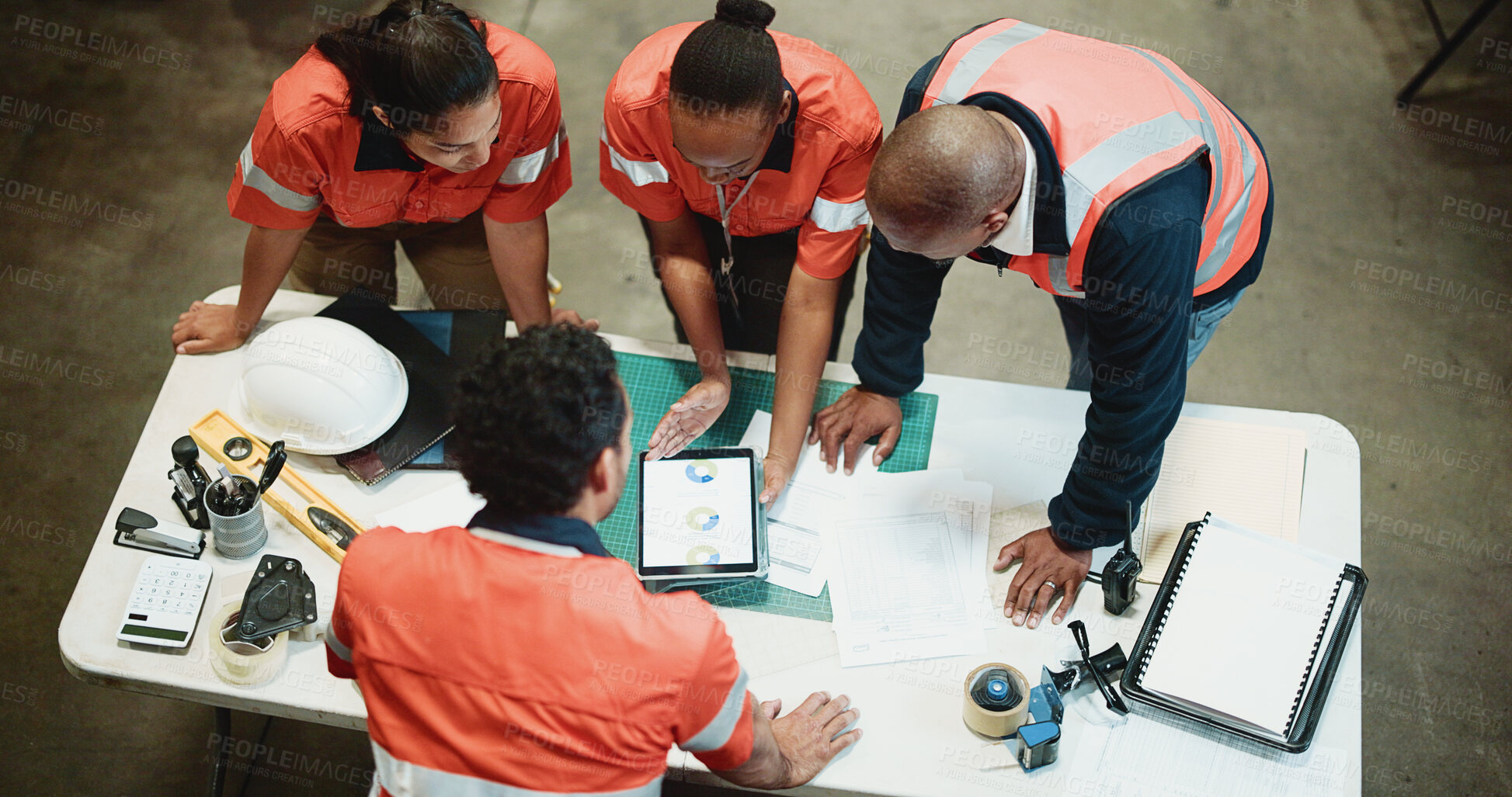 Buy stock photo Above, logistics or team at table with tablet, discussion or order backlog in supply chain. Distribution, people and workers in depot with tech, inventory management or collaboration in stock control