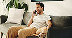 Man, dog and phone call on sofa, smile and relax with stroke, care and conversation for chat at home. Person, smartphone and pet animal on couch, connection or story gossip in lounge at apartment