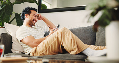Buy stock photo House, smartphone and man on couch, funny and typing with social media, smile and online reading. Laughing, mobile user and Asian person on sofa, cellphone and website info with connection or humor