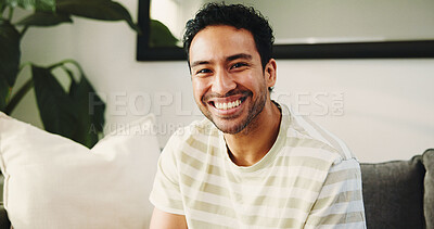 Buy stock photo House, portrait and man on couch, funny and happiness with weekend break in living room. Smile, laughing and Asian person on sofa, comfortable and afternoon with rest, relax and humor with confidence