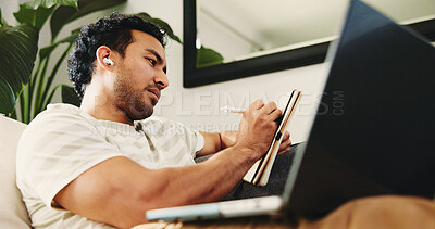 Buy stock photo Writing, ideas and man with earphones, home or songwriter with inspiration for music and remote work. Creative, notes and person with journal for lyrics, freelancer and song creation with laptop