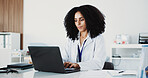 Laptop, doctor or woman typing in office for research, digital resources or medical archive for info. Review test results, email prescription or physician in clinic healthcare, pc or patient admin