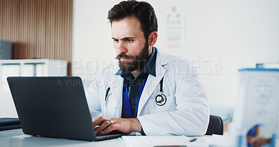 Buy stock photo Laptop, doctor or man reading in office for healthcare, digital resources or medical archive for info. Review test results, research or physician in clinic with computer, telehealth or patient admin