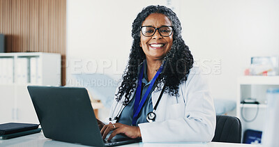 Buy stock photo Smile, black woman and portrait of doctor with laptop for medical, healthcare or admin in office. Cardiologist, mature person and tech with clinic schedule, telehealth or research for service
