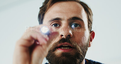 Buy stock photo Man, doctor and light for eye test, medical response or pupil check for brain assessment. Healthcare person, penlight exam and POV for nerve reaction, vision reflex and portrait for evaluation