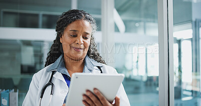 Buy stock photo Medical, tablet or mature woman in hospital with reading, info check or patient diagnosis in online consulting. Healthcare, digital or doctor with tech, telehealth or client records in treatment plan