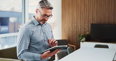 Buy stock photo Financial advisor, tablet and man in office, typing and connection with website for trading portfolio. Mature person, investor or employee with digital app, tech or email for audit results or network
