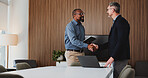 Shaking hands, deal and business men in office for partnership, agreement or collaboration. Happy, meeting and  male financial advisor with client for investment contract with handshake in workplace.