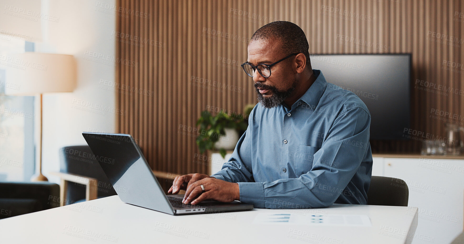 Buy stock photo Laptop, lawyer and business black man in office for research, proposal and review for case study. Professional, law firm and person on computer for information, legal strategy and planning for trial