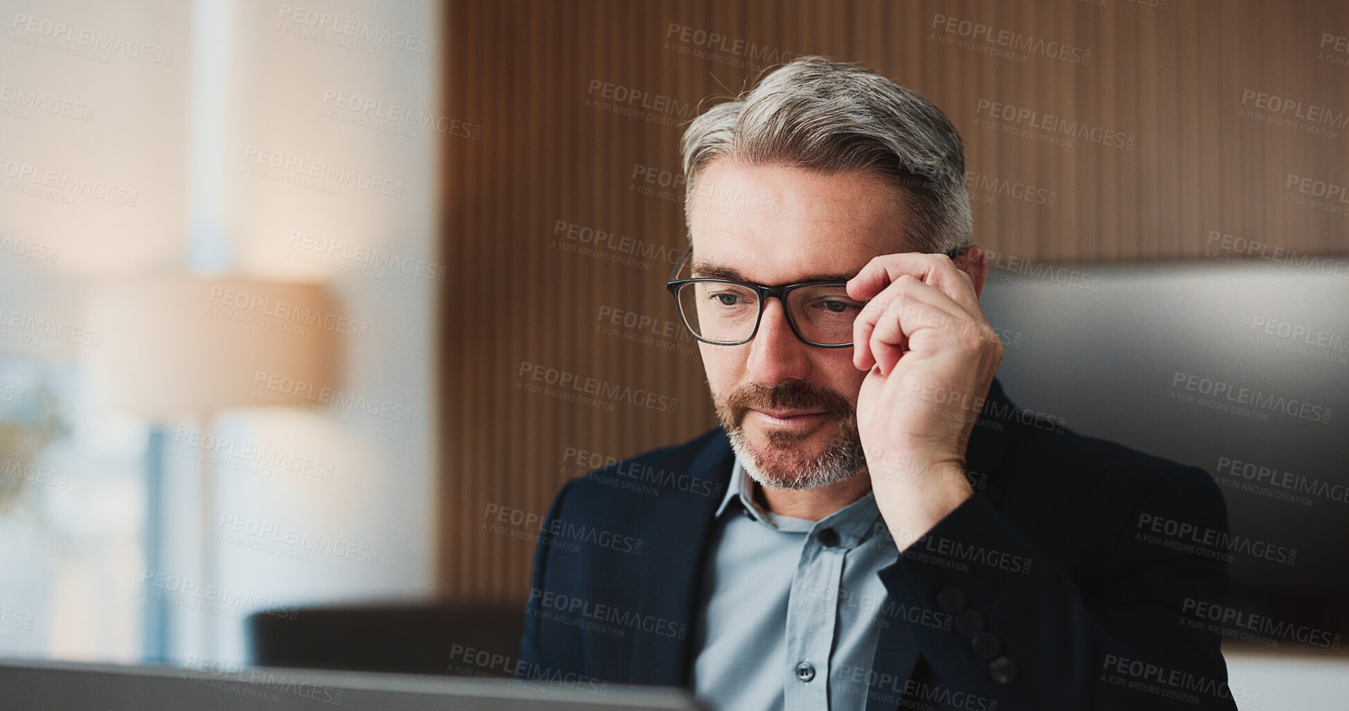 Buy stock photo Business, man and reading with laptop in office for research, financial report and budget comparison. Mature person, glasses and tech for accounting, finance proposal and information for investment