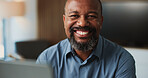 Office, portrait and man with laptop, pride and lawyer with research on website for case or justice. Law firm, mature attorney and black person with tech for evidence, confident and happy in Nigeria