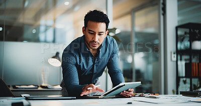 Buy stock photo Finance, review or analyst in office with tablet, funding ideas or data analysis for budget pitch. Research, paper and man in agency with tech, online report or proposal update for investment plan.