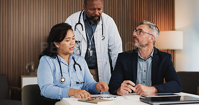 Buy stock photo Doctors, teamwork and conversation in meeting, healthcare and stats for hospital funds. People, men and woman with medical service, cooperation or talking with documents and graphs for patient intake