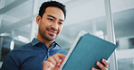 Creative, employee and man with tablet, office and research for design project on website or online. Happy, graphic designer and logo review with tech, low angle and plan for assignment in business