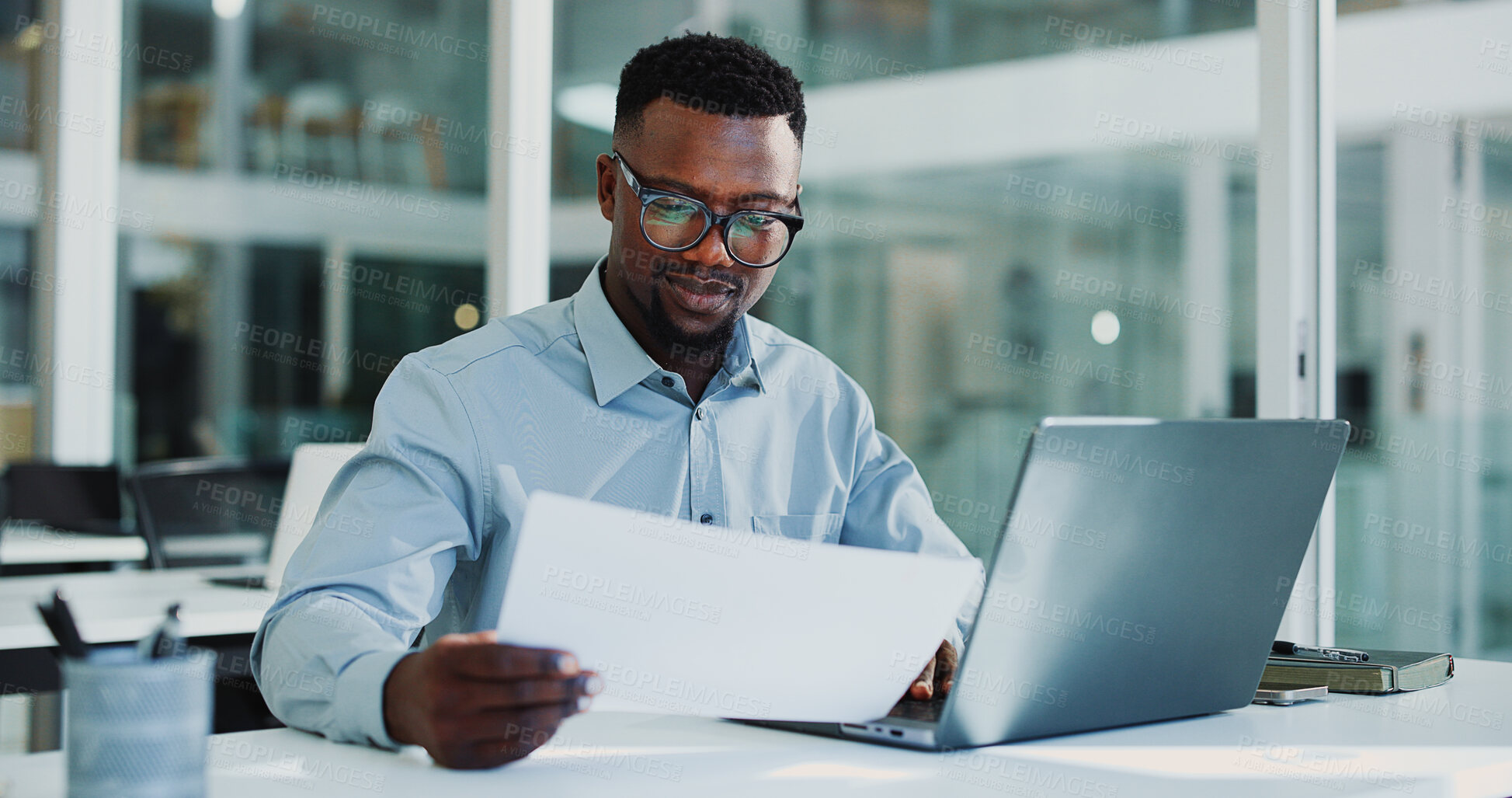 Buy stock photo Documents, laptop and business black man for financial review, proposal and budget planning for audit. Corporate, office and person with paperwork on computer for finance report, research or expenses