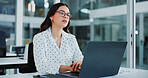 Laptop, thinking and businesswoman in office with research for finance report with budget planning. Glasses, computer and female financial advisor with ideas for investment proposal in workplace.