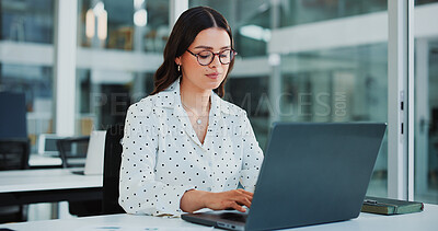 Buy stock photo Office, typing and business woman on laptop for financial review, investment research and website. Corporate, glasses and person on computer for finance report, budget planning and expense proposal