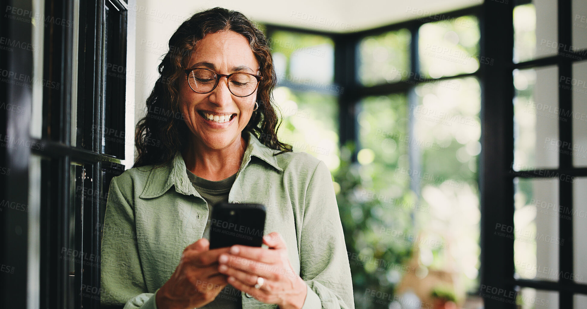 Buy stock photo Smile, reading and woman with phone in home, internet search and social media for browsing online. Happy, funny blog post or mature person with mobile app for forum discussion, comic story or message