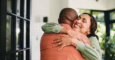 Buy stock photo Home, hug and couple with love, smile and bonding together with romance, relationship and care. Apartment, mature man and woman with happiness, marriage and embrace with trust, calm and commitment