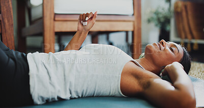 Buy stock photo Rest, headphones or woman on yoga mat for workout, relax or music playlist after training. Fitness, subscription or female person in house with tech, calm podcast or audio streaming on exercise break