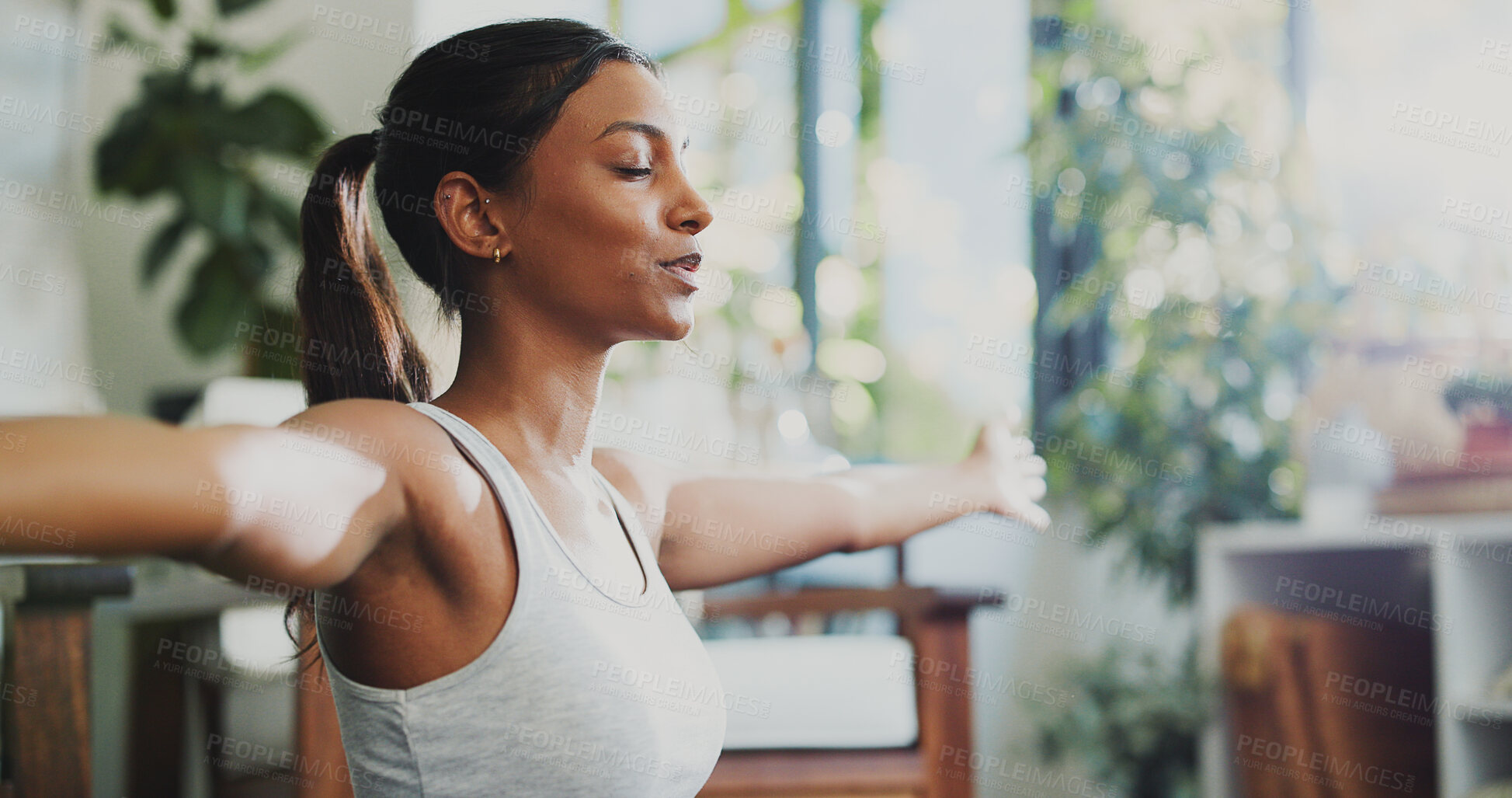 Buy stock photo Fitness, woman and yoga in home with stretching arms, breathwork exercise and meditation for wellness. Bokeh, zen person and breathing in house with pilates for mindfulness, inner peace and balance.
