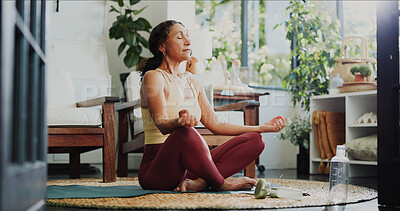 Buy stock photo Mindfulness, yoga and calm woman in home, awareness practice and grounding exercise for mental health. Peace, meditation and person with lotus pose for wellness, holistic activity and spiritual zen