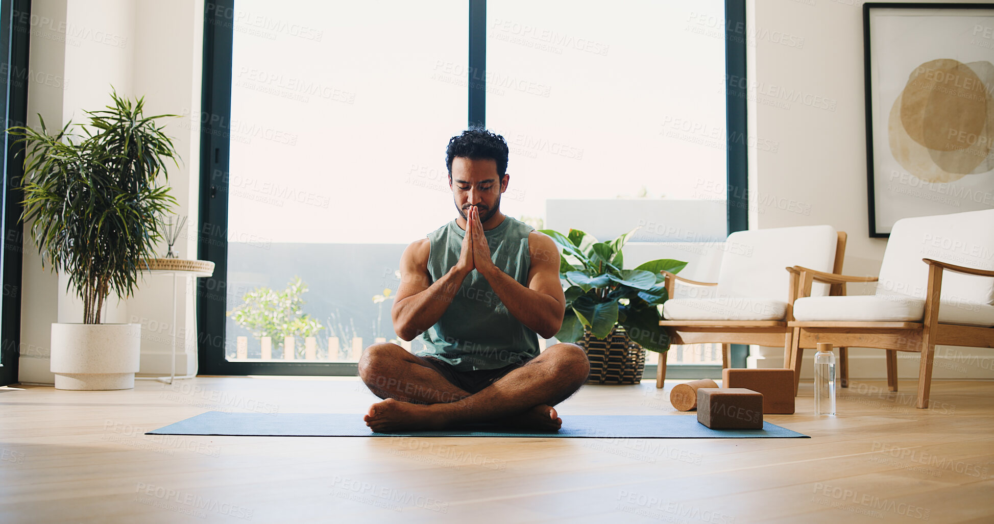 Buy stock photo Yoga, meditation and man in home, namaste and mindfulness for inner peace, calm and wellness on mat. Zen, person and spiritual awareness for mental health, yogi and prayer hands for stress relief
