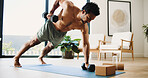 Fitness, man and plank in house with dumbbells for balance exercise, strength training or bodybuilding. Active, person and weights on floor with core engagement for stability, workout or performance.