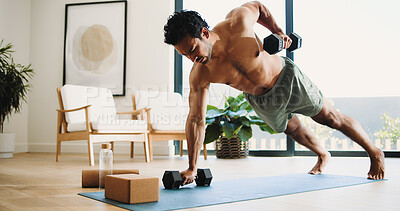 Buy stock photo Fitness, man and plank in house with weights for balance exercise, strength training and bodybuilding. Active, person and dumbbells in apartment with workout for stability, endurance and performance.