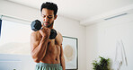 House, fitness and man with dumbbell for workout, strength development or muscle gain for body goals. Challenge, low angle or active athlete with bicep exercise, health or weightlifting for training