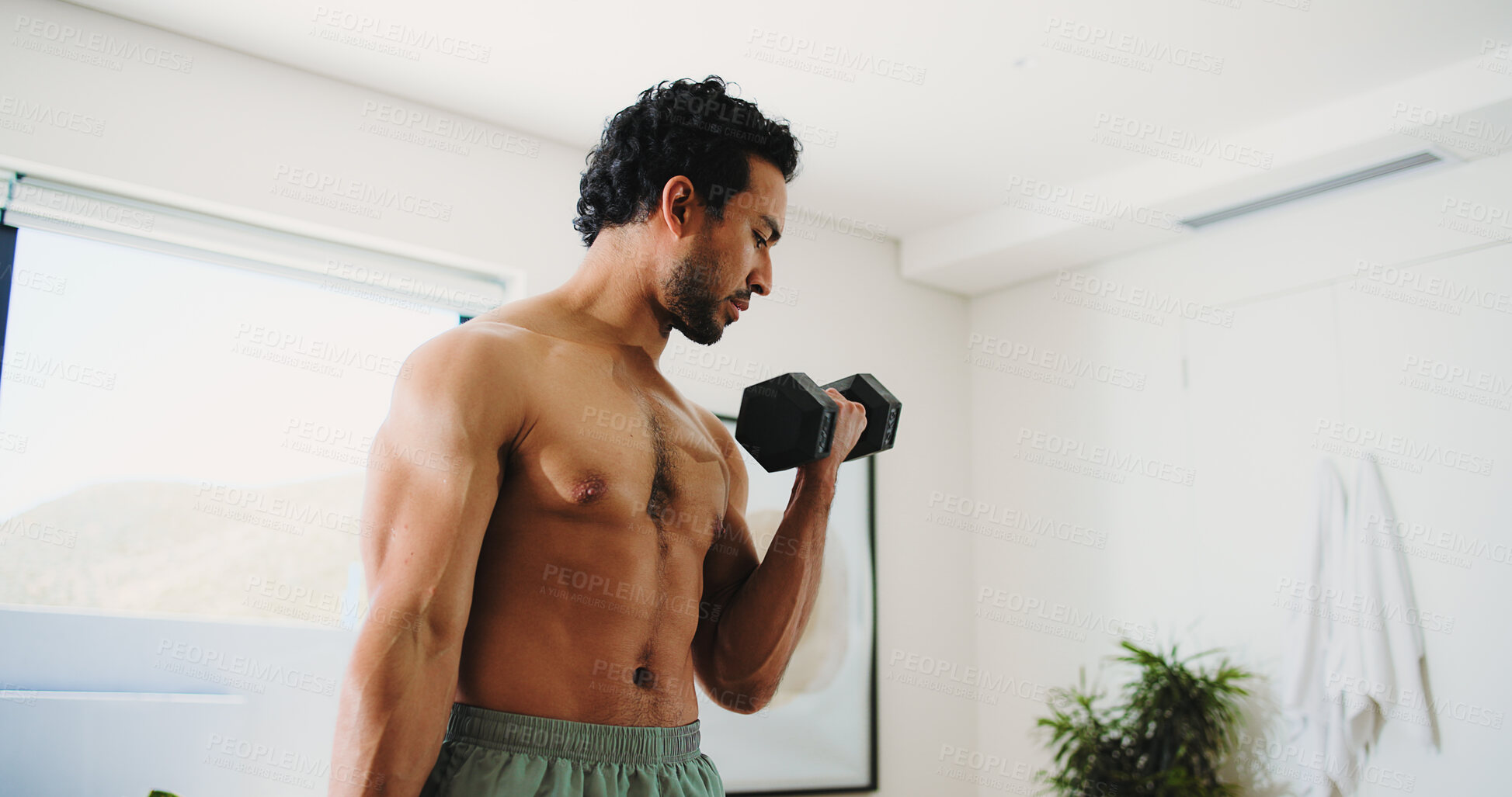 Buy stock photo Home, fitness and man with dumbbell for workout, strength development or muscle gain for body goals. Challenge, strong or active bodybuilder with arm exercise, low angle or weightlifting for training
