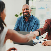 Interview, introduction or people in office with handshake ...