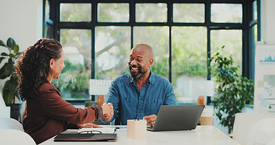 Buy stock photo Handshake, deal and people in office with laptop, collaboration or meeting for b2b proposal. Shaking hands, approval or employees in agency with tech, negotiation or shared opportunity for success.