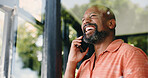 Phone call, talking and black man laugh in home for conversation, funny chat and connection. Window, happy and person on smartphone for communication, contact and discussion for social networking