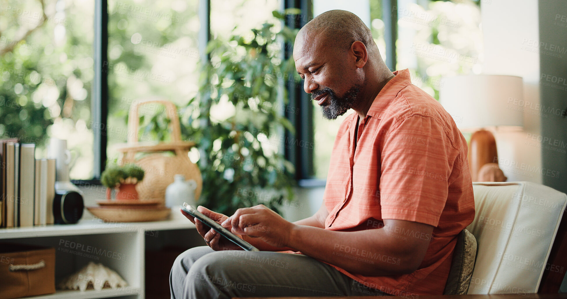 Buy stock photo Happy, home and mature black man on tablet for internet, subscription and website for contact. House, communication and person on digital tech for networking, online email and connection on sofa