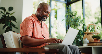 Buy stock photo Remote work, typing or black man in house with laptop, lead update or edit of news article. Freelancer, mature person or journalist in home with technology, fact check or source contact on email.