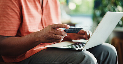 Buy stock photo Man, hands and credit card in apartment with laptop, payment and discount promo for online shopping. Person, typing and fintech in house with computer, bank transaction or eft purchase for ecommerce.