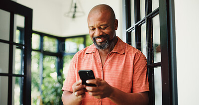 Buy stock photo Smile, reading or black man with phone in home, internet search or social media for browsing online. Happy, funny blog post or mature person with mobile for forum discussion, comic story or message