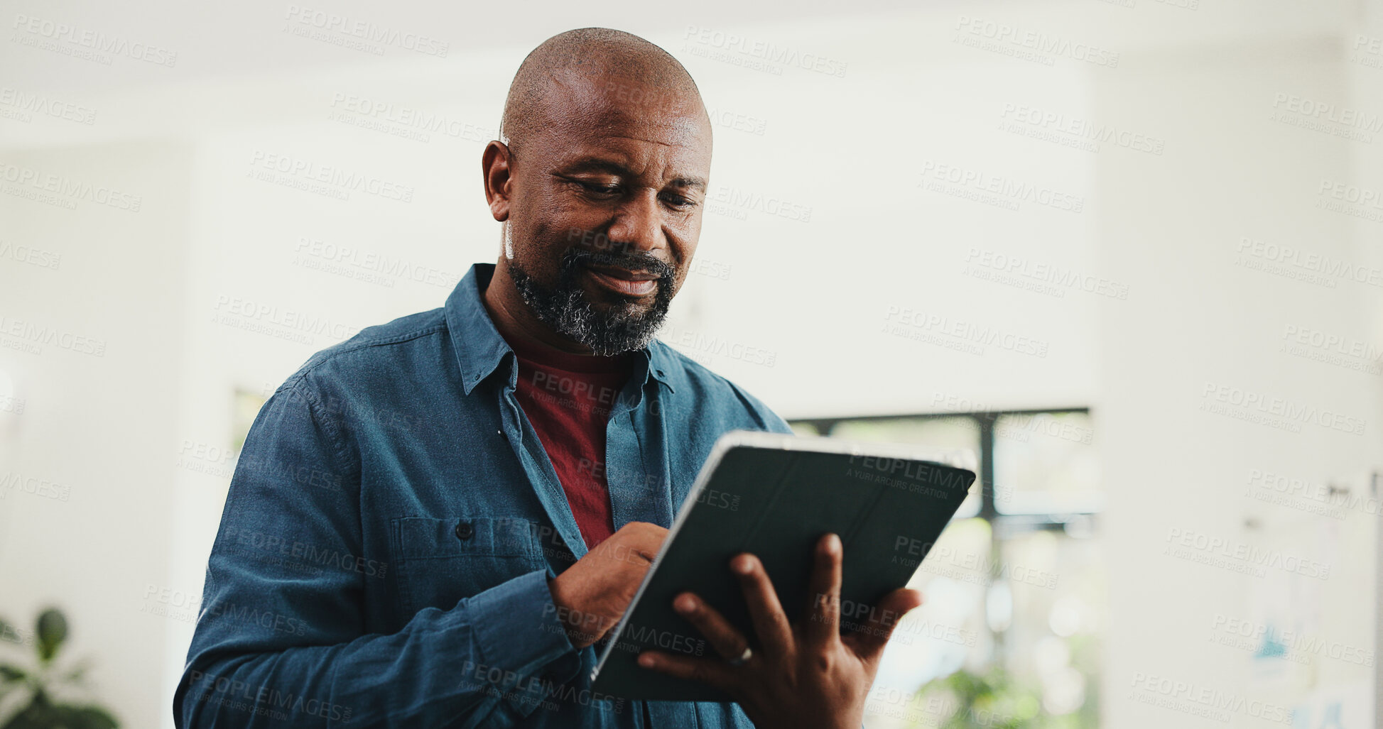 Buy stock photo Web design, black man or reading with tablet in home, site optimization or check homepage features. Review project, freelancer or mature person with domain update, tech or planning for brand identity