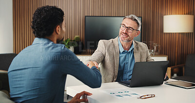 Buy stock photo Business people, handshake and talk in office with laptop for agreement, statistics review and report. Happy men, shaking hands or discussion in workplace with computer, data analysis or partnership.