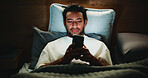 Night, man and scroll in bed with phone for text message reply, social media and watching viral video. Late, person and browse with tech in apartment for online conversation, internet and mobile app.